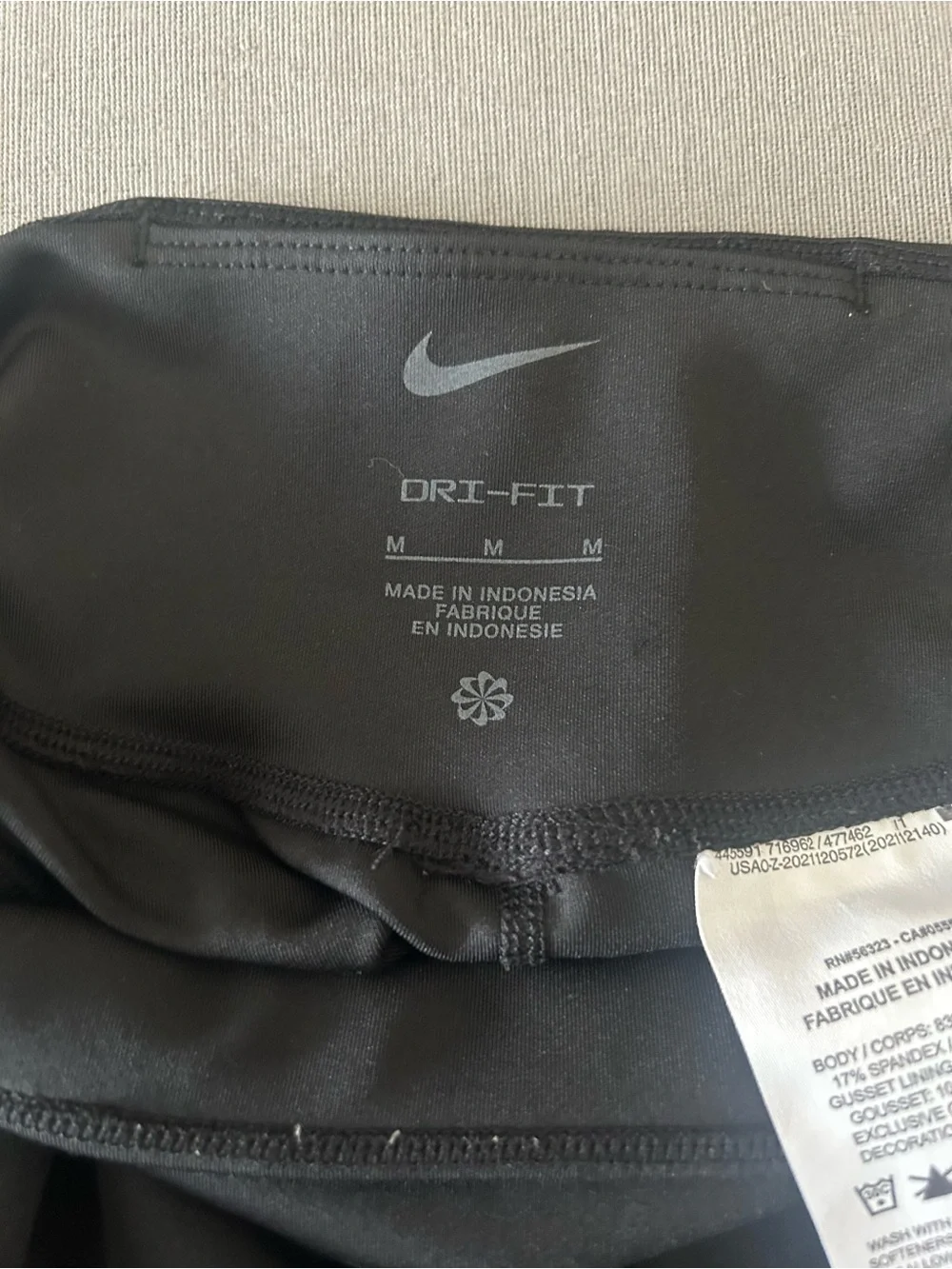 Nike Black Kids Performance Leggings with White Swoosh